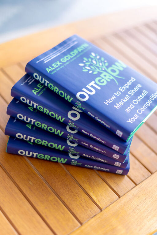 stack of outgrow books